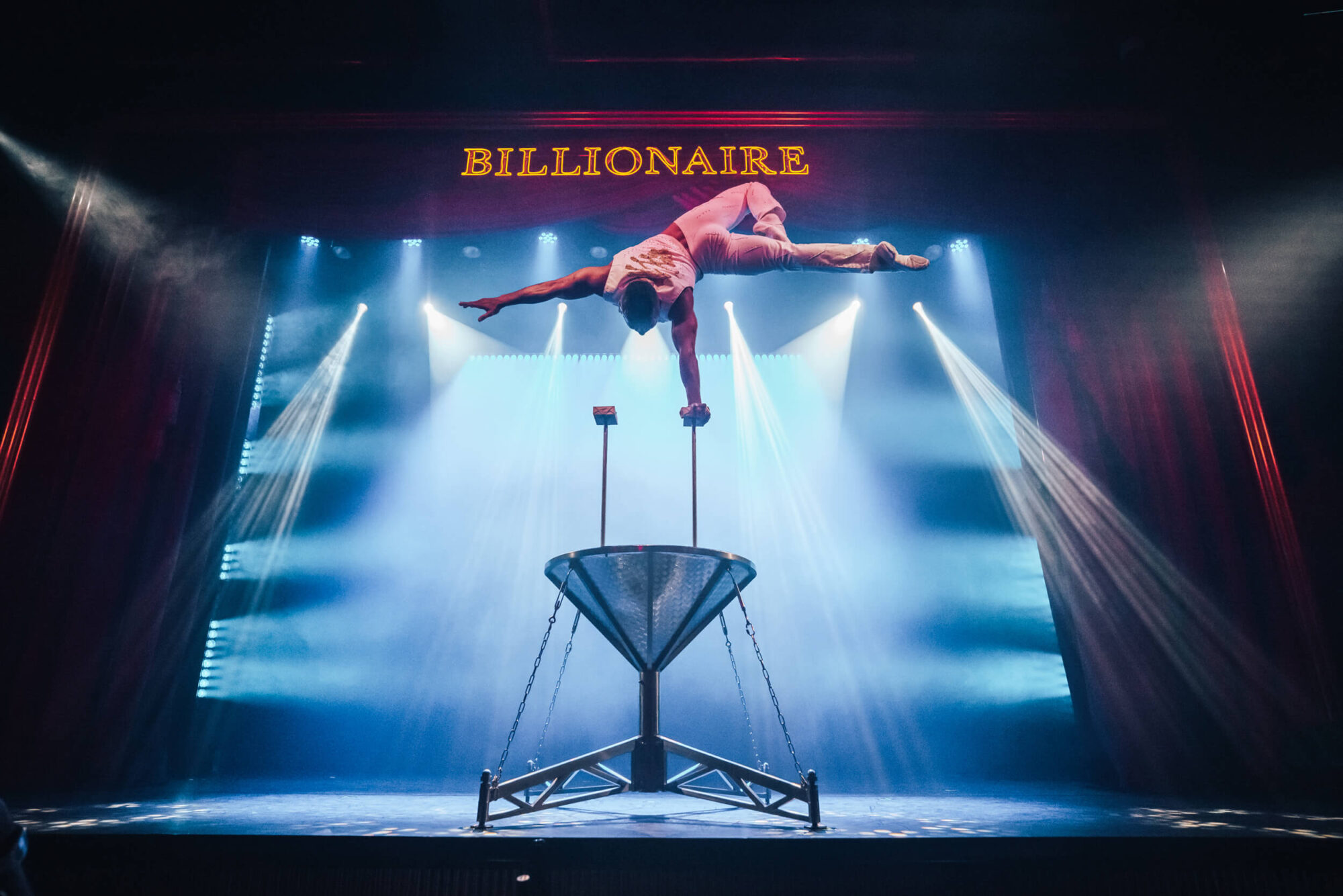 Billionaire Performer Balancing